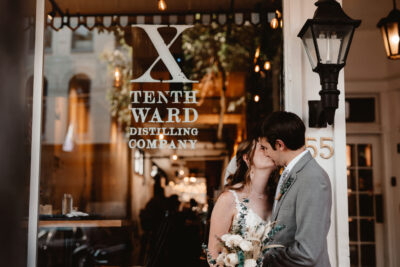 Tenth Ward wedding venue with couple after ceremony