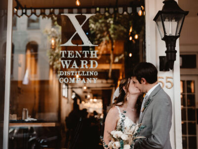 Tenth Ward wedding venue with couple after ceremony